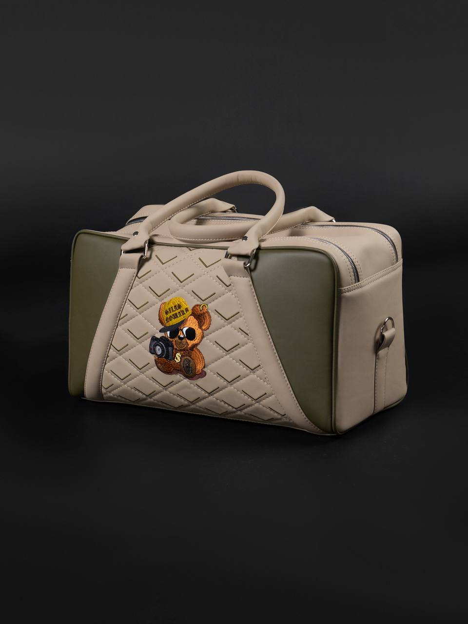 Bespoke duffle in sand and olive leather with hand-embroidered bear motif