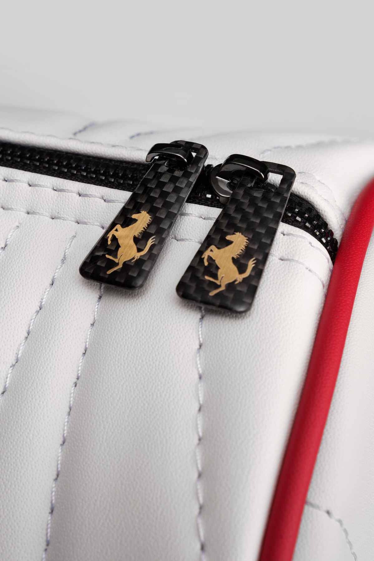 Carbon fiber zipper pulls
