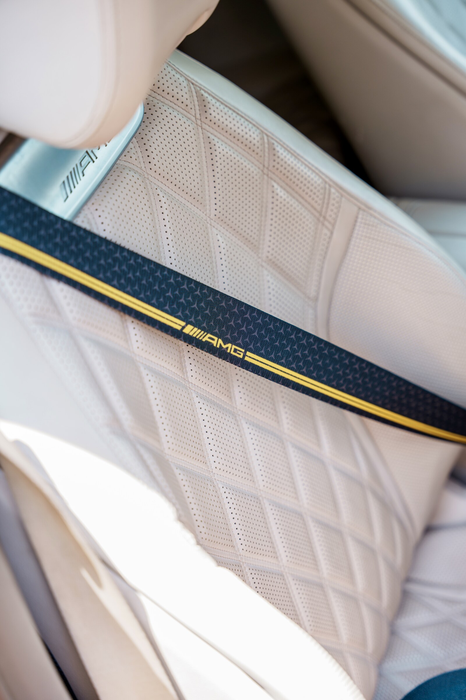 AMG seatbelt on white quilted leather