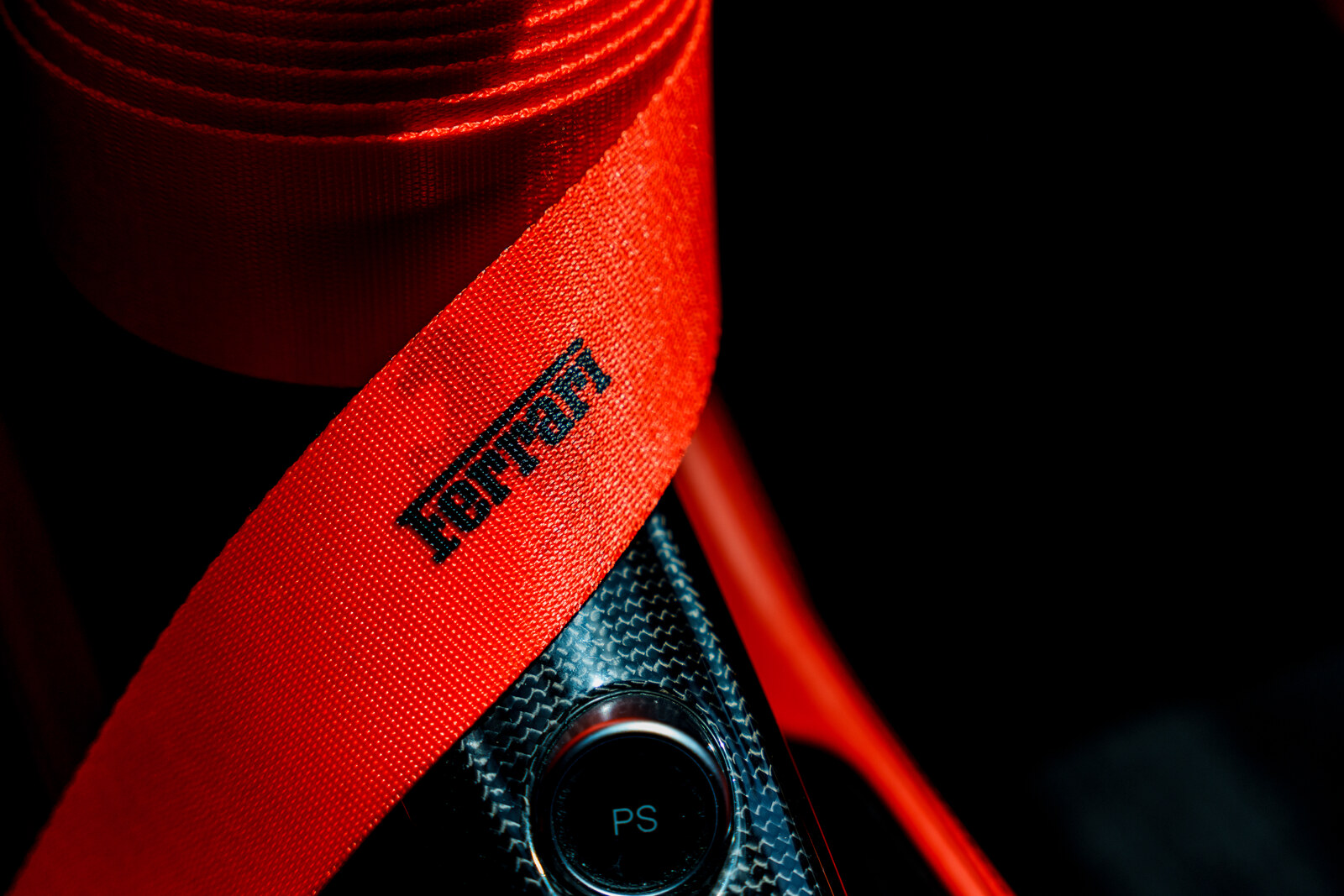 Ferrari red seatbelt detail