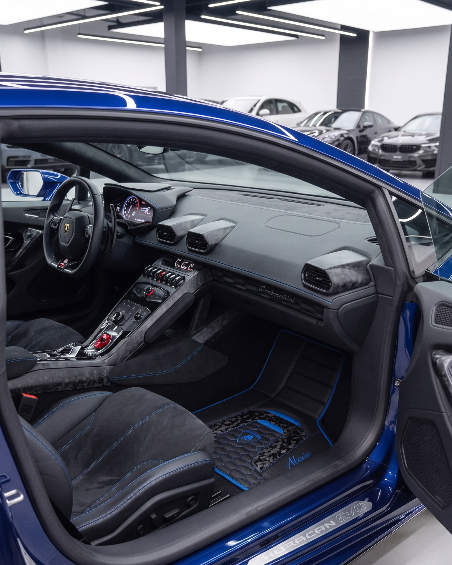Driver footwell, mats matched to the cabin stitching