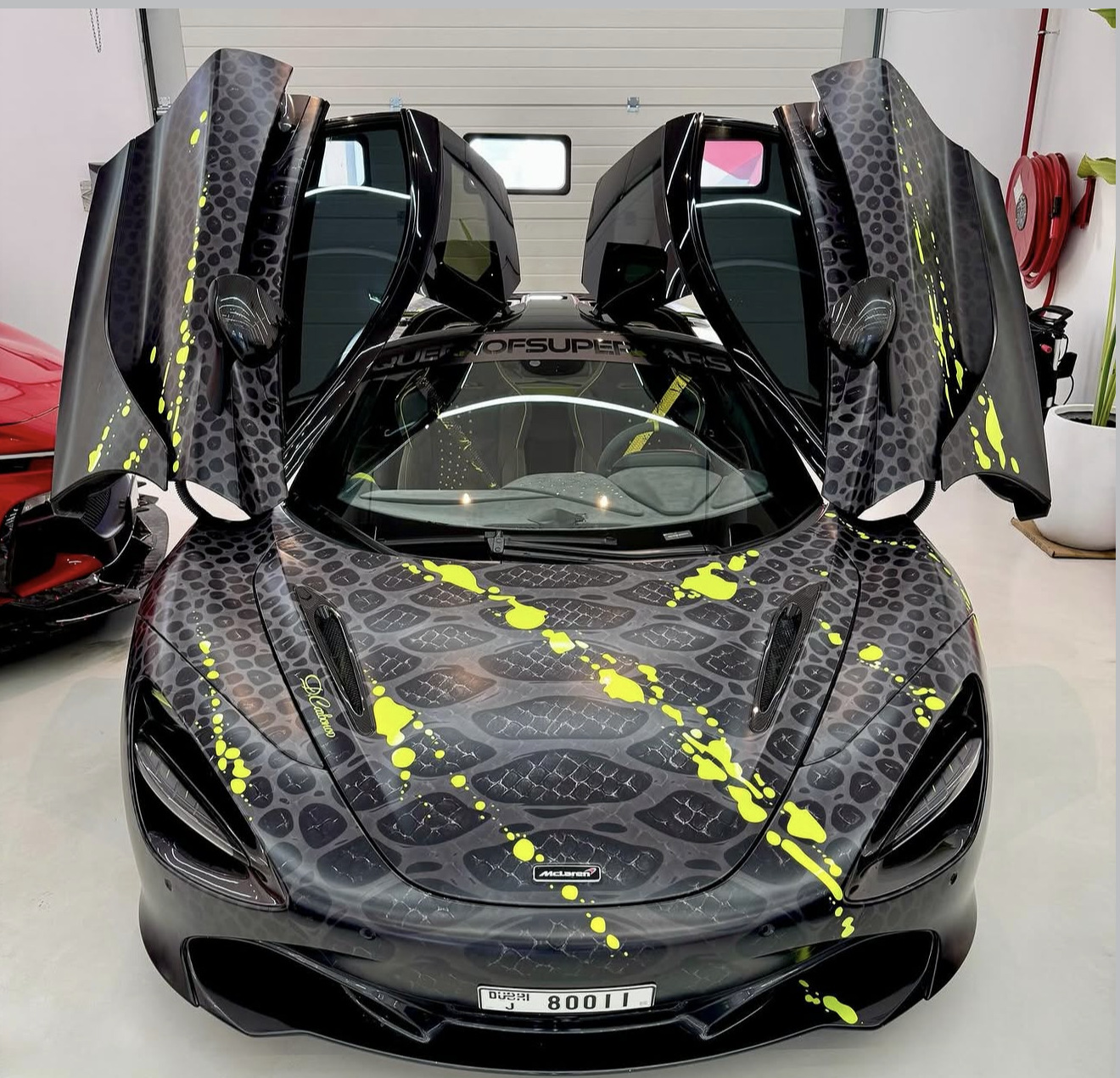 McLaren 720S in snake-skin wrap, doors up