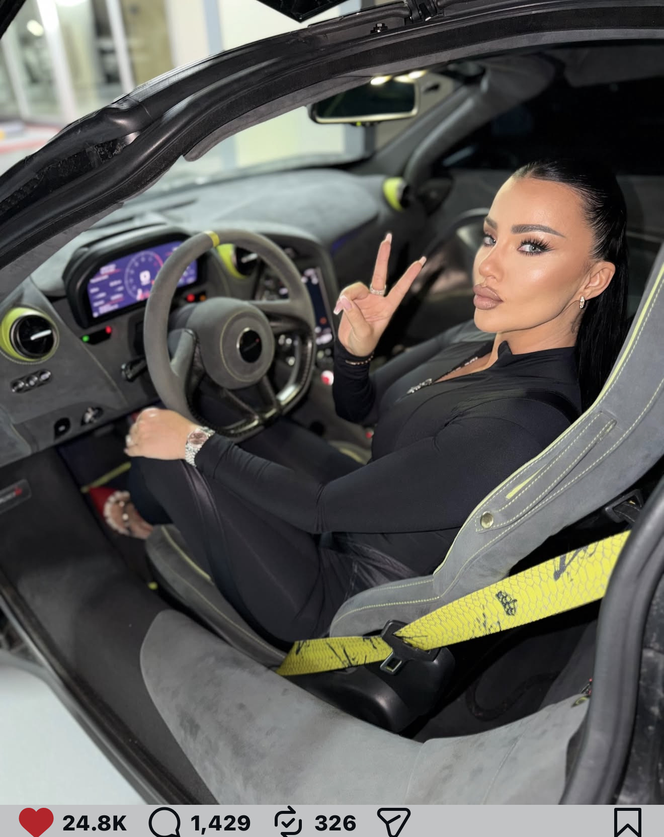 Queen of Supercars with the neon snake-skin belt