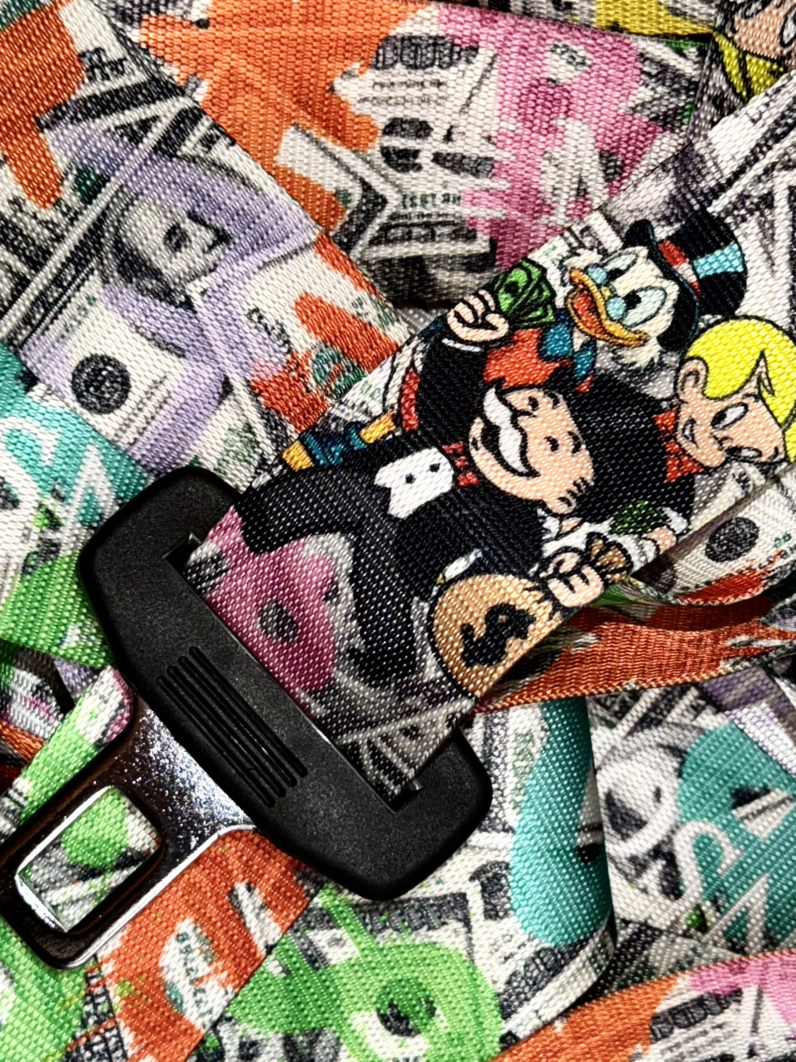 Printed webbing in dollar and Monopoly artwork