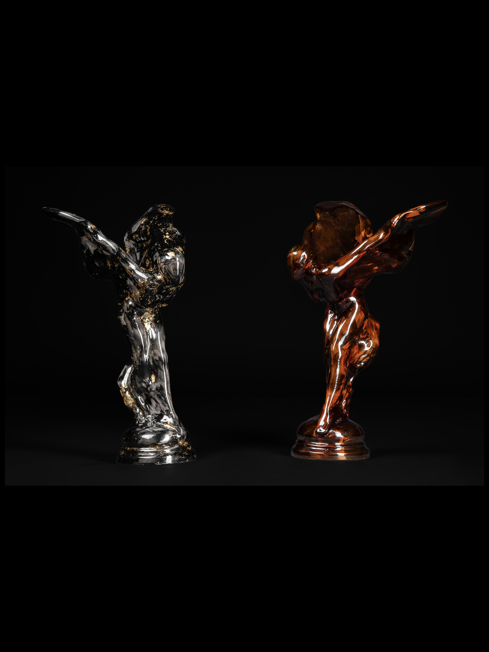 Two Spirit of Ecstasy figures in forged carbon fiber